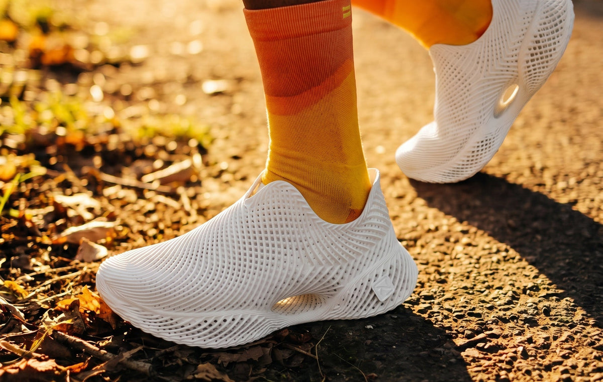 Hero image: a 3D-printed sneaker with an open lattice midsole
